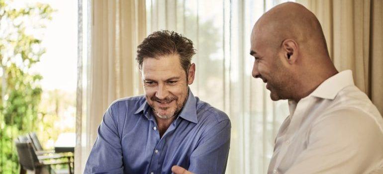 Two men talking